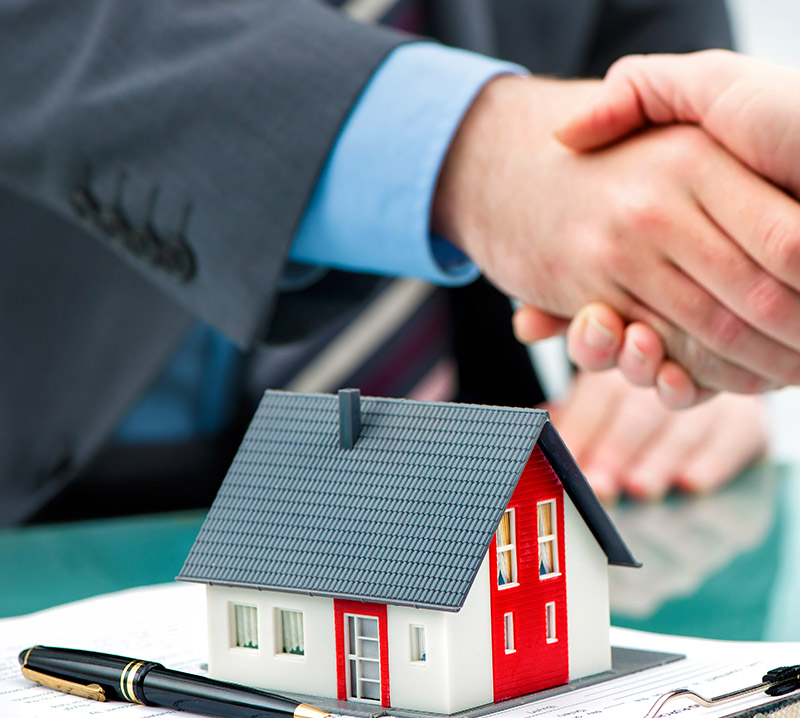 Business Handshake :: Buying A Property